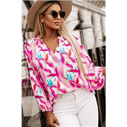Розовая блуза свободного кроя с абстрактным принтом