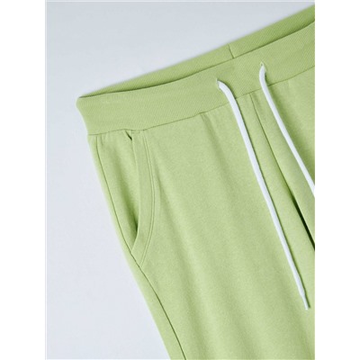 Легкие спортивные брюки из однотонной ткани Пастельный зеленый
