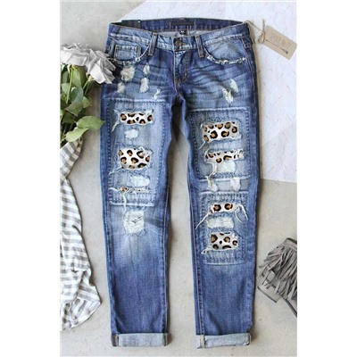 Голубые потертые джинсы с леопардовыми заплатками